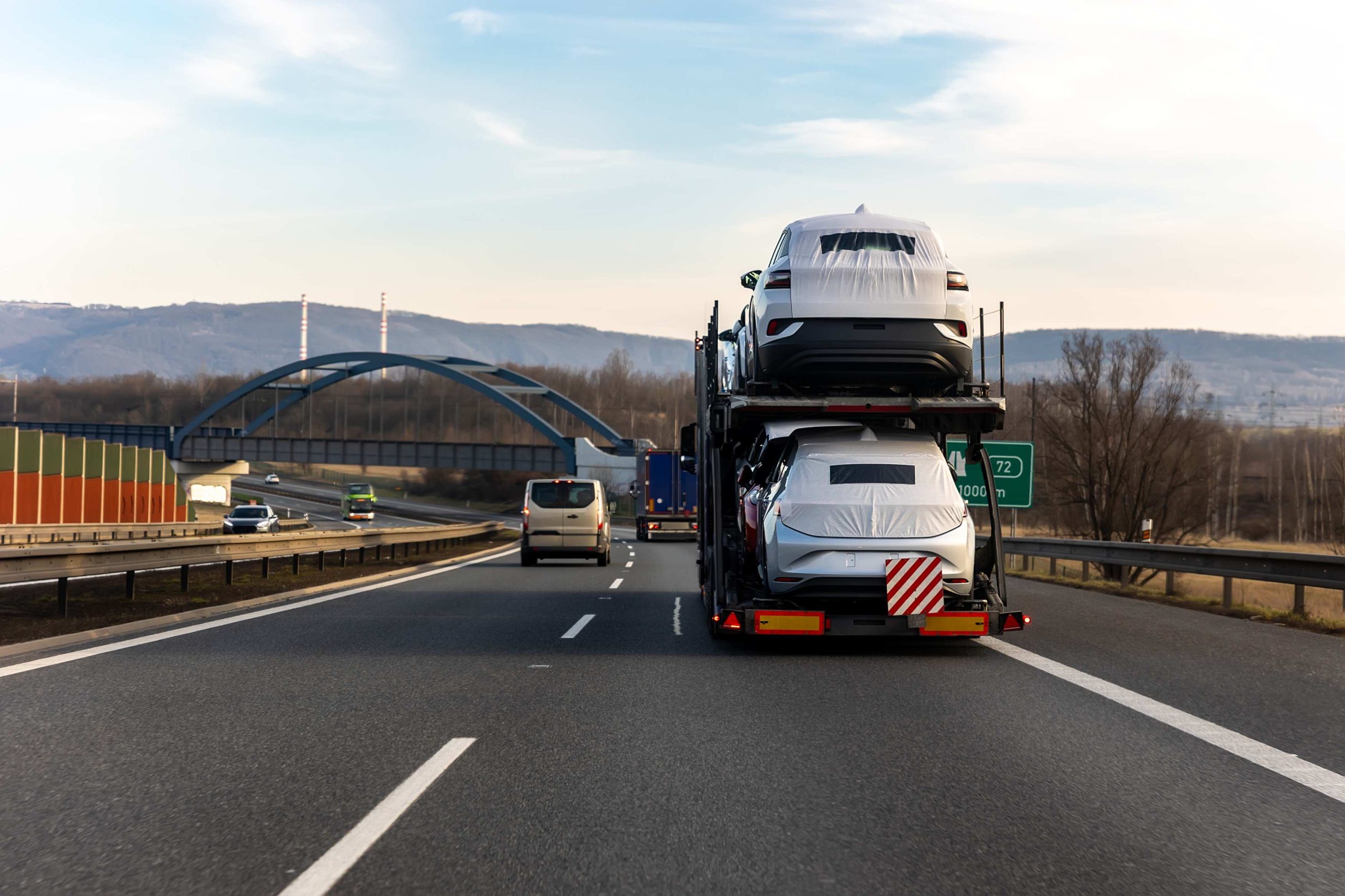 tow-truck-car-carrier-semi-trailer-on-highway-carr-2025-01-10-05-55-31-utc (1)